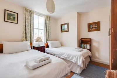 a bedroom with two beds and a window at 3 Bed in Aldeburgh oc-ahs in Aldeburgh