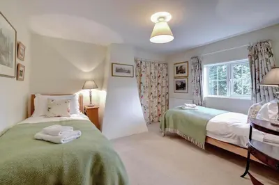 a bedroom with two beds and a window at 2 Bed in Iken oc-sfboo in Sudbourne
