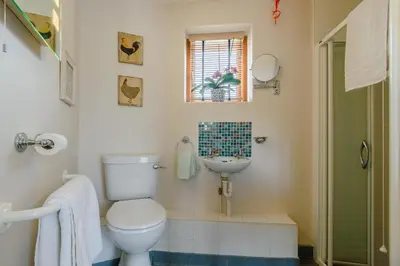 a bathroom with a toilet and a sink at 4 Bed in Bramfield oc-sfbri in Bramfield