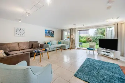 a living room with a couch and a tv at 4 Bed in Friston oc-colu in Friston