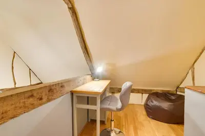 a room with a desk and a chair in a attic at 2 Bed in Bramfield oc-cobb in Bramfield