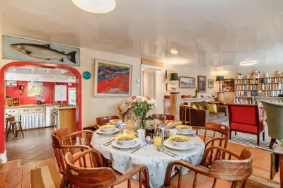 a dining room with a table and chairs at 4 Bed in Aldeburgh oc-sfcrr in Aldeburgh