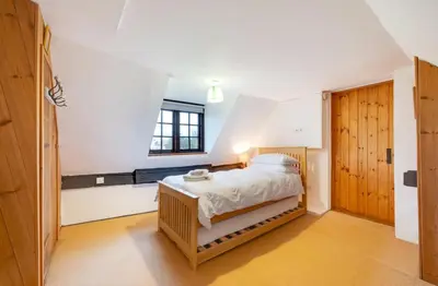 a bedroom with a bed and a window at 3 Bed in Hemley oc-g91 in Hemley