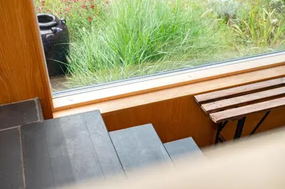 a window with a bench in front of a field of grass at 3 Bed in Bramfield oc-hglenv in Bramfield
