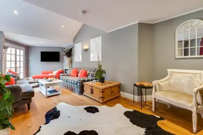 a living room with a couch and two chairs at 2 Bed in Tunstall oc-ivylod in Rendlesham