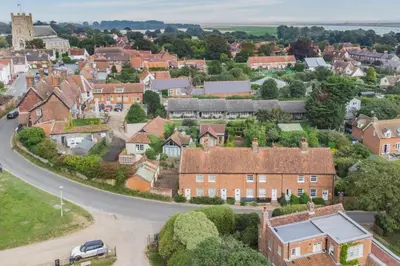 an aerial view of a small town with houses at 2 Bed in Orford oc-sflis in Orford