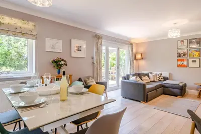 a living room with a table and a couch at 3 Bed in Westleton oc-egv in Westleton