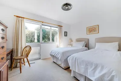 a bedroom with two beds and a window at 3 Bed in Aldeburgh oc-spr in Aldeburgh