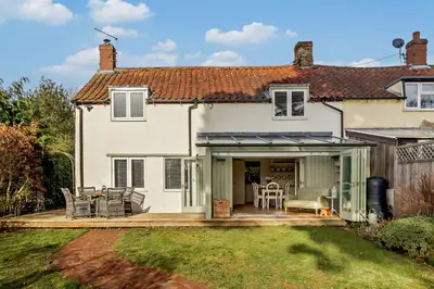 an extension to a house with a patio at 4 Bed in Westleton oc-s27303 in Westleton