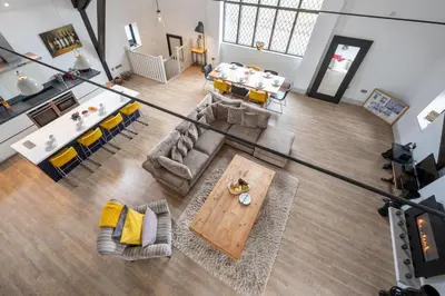 an overhead view of a living room with a table and chairs at 4 Bed in Thorpeness oc-cho in Thorpeness