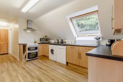 a kitchen with white appliances and a window at 2 Bed in Woodbridge oc-vav in Hollesley
