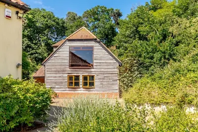 a house with a window on the side of it at 2 Bed in Woodbridge oc-vav in Hollesley