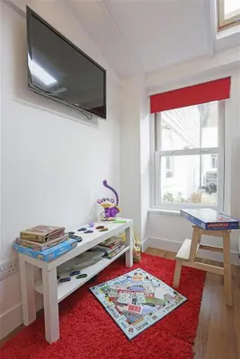 a living room with a flat screen tv on the wall at 2 Bed in Aldeburgh oc-tsc in Aldeburgh