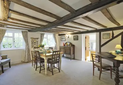 a dining room with a table and chairs at 3 Bed in Leiston oc-wil in Theberton