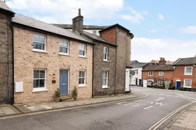 a row of brick houses on a street at 2 Bed in Woodbridge oc-zep in Woodbridge