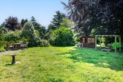 a yard with a picnic table and a gazebo at 4 Bed in Halesworth oc-willho in Halesworth