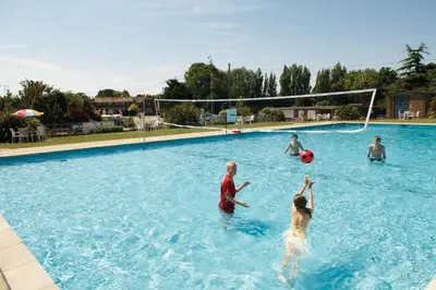a group of people playing soccer in a swimming pool at Vacation Escape - Valley Farm -Clacton-on-sea - Holiday Park in Clacton-on-Sea